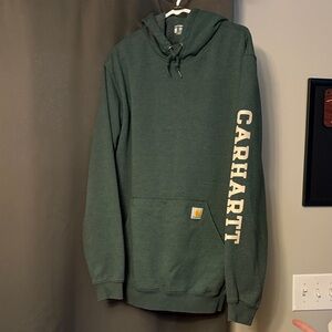 Carhartt Forest Green/Khaki Hoodie with Logo down sleeve and on back as shown.